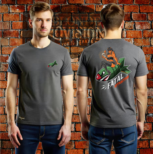 Man wearing a gray t-shirt with a graphic design on the front and back, standing against a brick wall.
